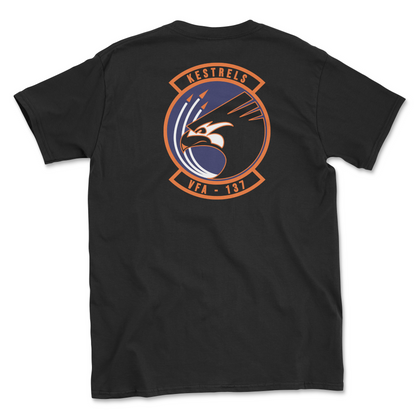 Black t-shirt with squadron patch.