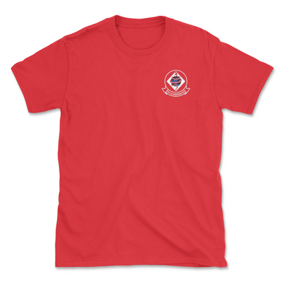 Red t-shirt with squadron patch.