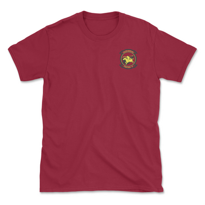 Red t-shirt with squadron patch.